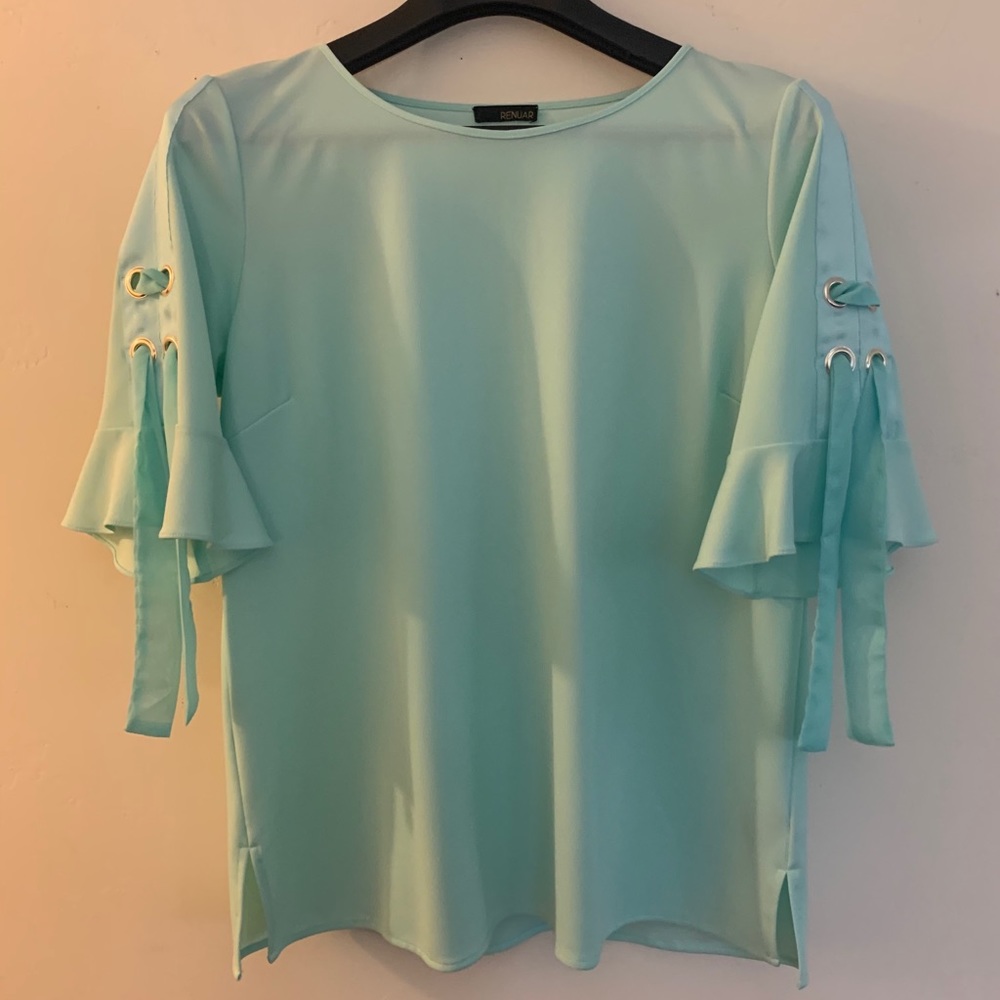 Light colored pastel blouse. Brand New.
